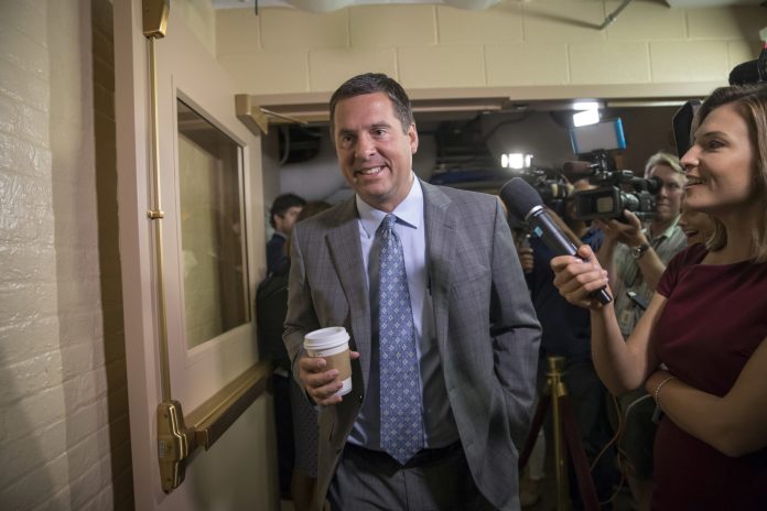 FILE - In this July 28, 2017, file photo, House Intelligence Committee Chairman Rep. Devin Nunes, R-Calif., walks on Capitol Hill in Washington. A political research firm behind a dossier of allegations about President Donald Trump's connections to Russia is balking at subpoenas from the House intelligence committee, with a lawyer for the firm questioning the legitimacy of the panel's probe into Russian meddling. Joshua Levy, a lawyer for Fusion GPS, said in a letter to the panel on Oct. 16 that Nunes is acting "in bad faith."(AP Photo/J. Scott Applewhite, File)