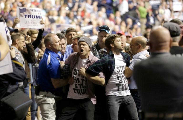 The video is hot on the heels of criticism over Trump's dismissal of a pattern of violence at his rallies. (AP Photo/Gerry Broome)