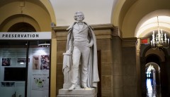 Who are the figures whose statues the House voted to remove?