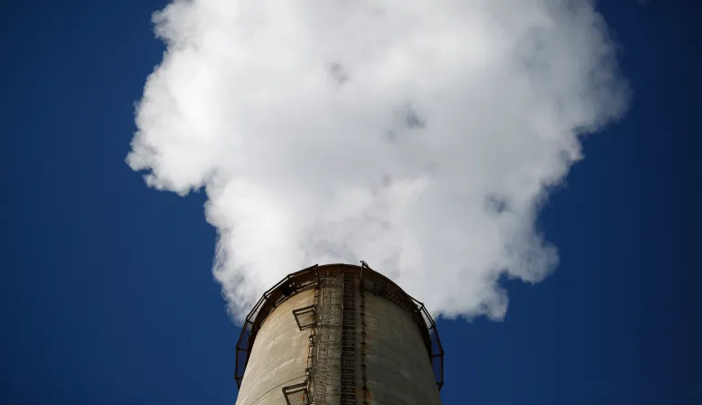 Water vapor rises from the NRG Energy Inc. WA Parish generating station in Thompsons, Texas, U.S., on Thursday, Feb. 16, 2017. The plant is home to the Petra Nova Carbon Capture Project, a joint venture between NRG Energy and JX Nippon Oil & Gas Exploration Corp., which reportedly captures and repurposes more than 90% of its own Co2 emissions.