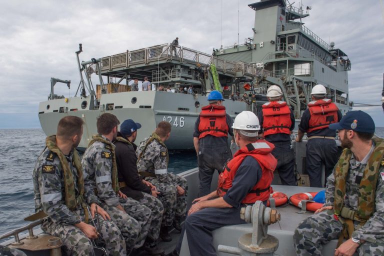 Sailors from the USS Ashland and Royal Australian Navy divers take part in recovery operations Aug. 8 after an MV-22 Osprey crashed three days earlier. (U.S. Navy photo)?