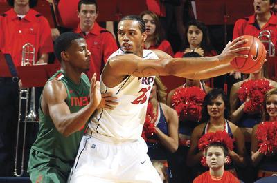 Andrew Shurtleff/AP
Virginia forward Mike Scott is averaging a team-high 16.5 points a game this season.