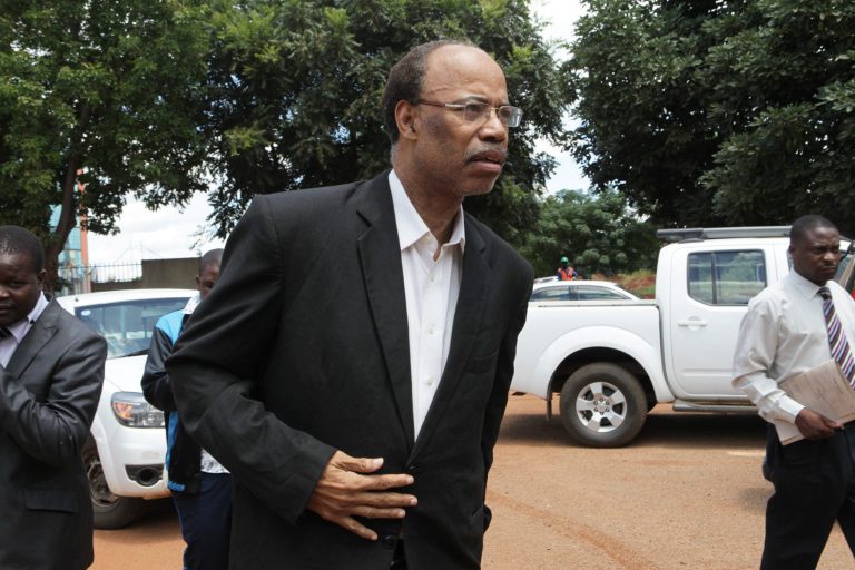 Former U S Congressman, Mel Reynolds, arrives to appear at the magistrates courts in Harare, Wednesday, Feb. 19, 2014. Reynolds was arrested  in Zimbabwe for allegedly possessing pornographic material and violating immigration laws. (AP Photo/Tsvangirayi Mukwazhi)