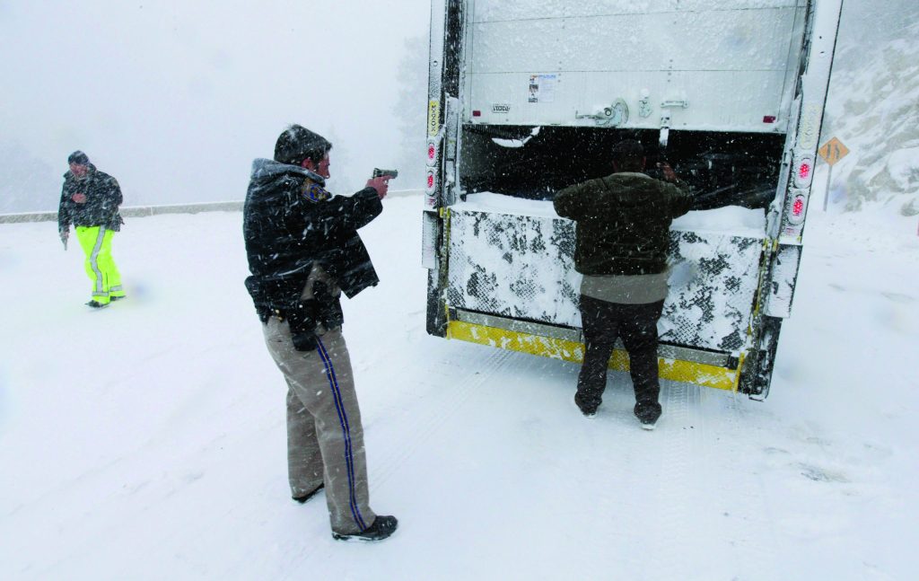 Clear sky aids mountain hunt for fugitive ex-cop