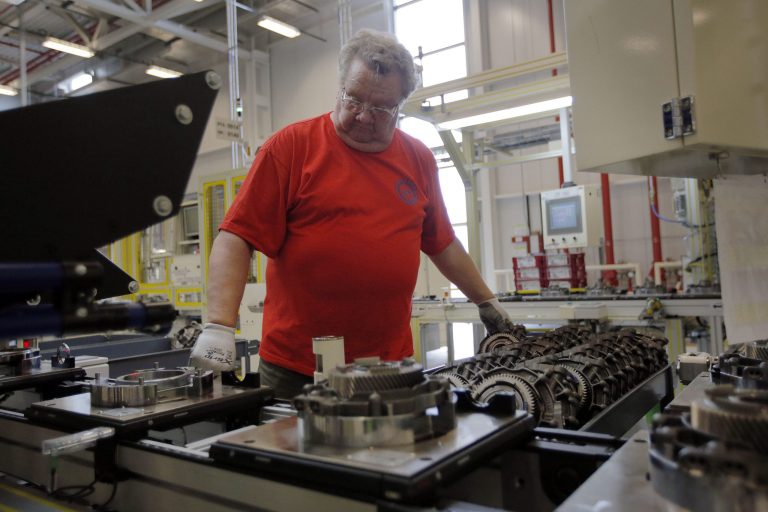 In this May 13, 2014 photo, Dave Roop, of Cicero, Ind., works on the line of a Chrysler transmission manufacturing facility in Tipton, Ind. The Institute for Supply Management releases its manufacturing index for May on Monday, June 2, 2014. (AP Photo/AJ Mast)