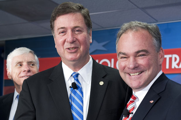 Virginia Senate candidates, former Governors George Allen, Republican, center, and Tim Kaine, Democrat, right, pose for a photograph during the Northern Virginia Technology Council's Tech Town Hall in Reston, Va., Thursday, June 28, 2012. (AP Photo/Cliff Owen)
