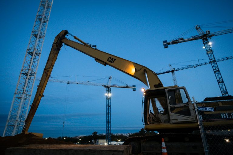In this Tuesday, Oct. 22, 2013, photo, heavy construction equipment is idle early in the morning at the site of the new Smithsonian African American History and Culture Museum in Washington. The government reports on U.S. construction spending in October on Monday, Dec. 2, 2013. (AP Photo/J. David Ake)