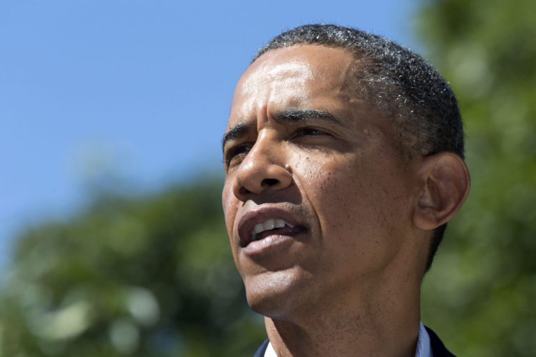   FILE- In this Aug. 15, 2013, file photo, President Barack Obama makes a statement to reporters regarding events in Egypt from his rental vacation home in Chilmark, Mass., on the island of Martha's Vineyard. As Arab Spring democracy uprisings spread across the Middle East, Obama's response to the political unrest has been to voice support for people seeking representative governments but limit the role the United States will play to shape those efforts. (AP Photo/Jacquelyn Martin, File)  