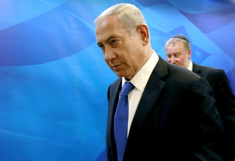 Israeli Prime Minister Benjamin Netanyahu arrives to chair the weekly cabinet meeting at his Jerusalem office, Sunday, March 8, 2015. (AP Photo/Gali Tibbon, Pool)
