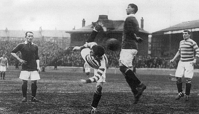 A match is pictured in the early 1900s between Heart of Midlothian and Celtic football clubs in the United Kingdom.
