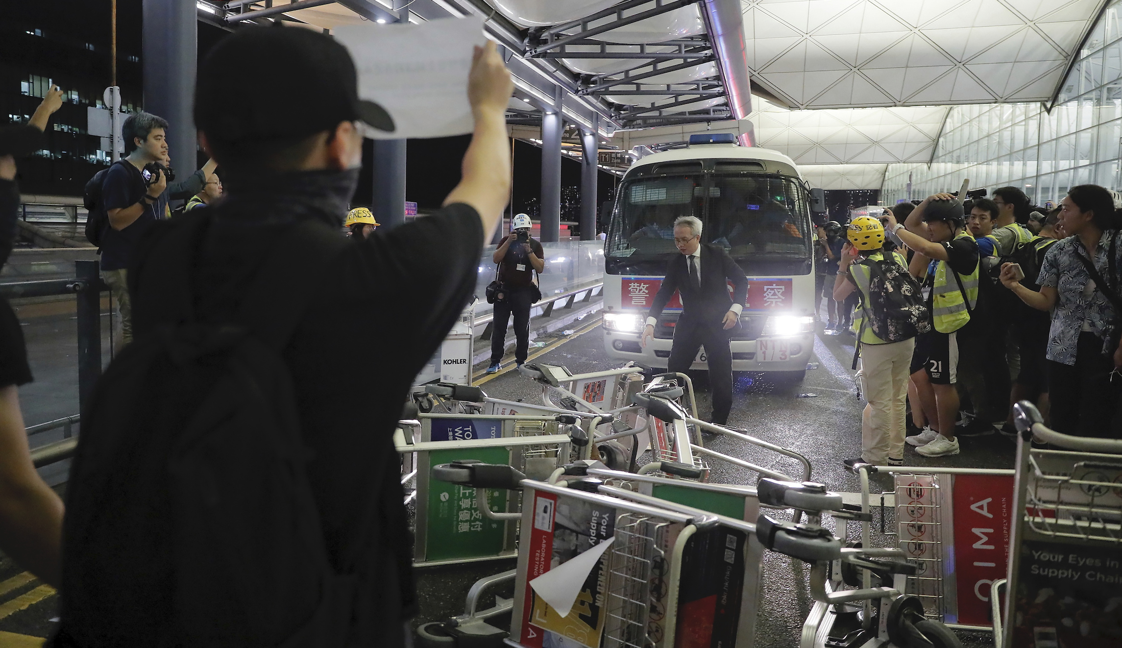 Chinese military amasses outside Hong Kong as protests continue