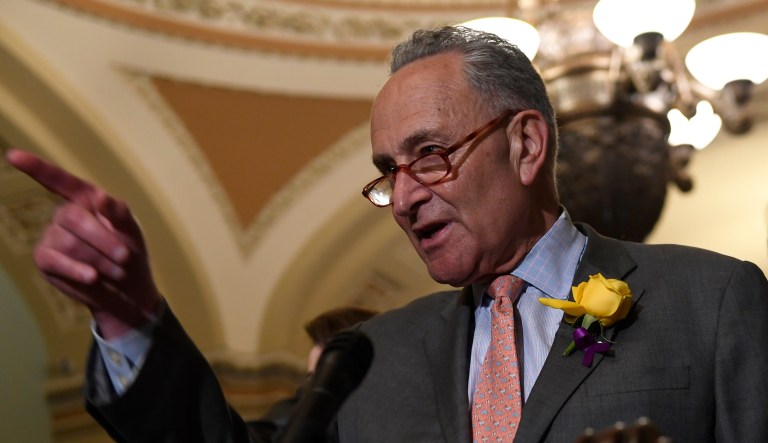 Senate Minority Leader Sen. Chuck Schumer of N.Y., speaks to reporters following the weekly policy lunches on Capitol Hill in Washington, Tuesday, June 4, 2019. Sen. Tim Kaine, D-Va., listens at right.