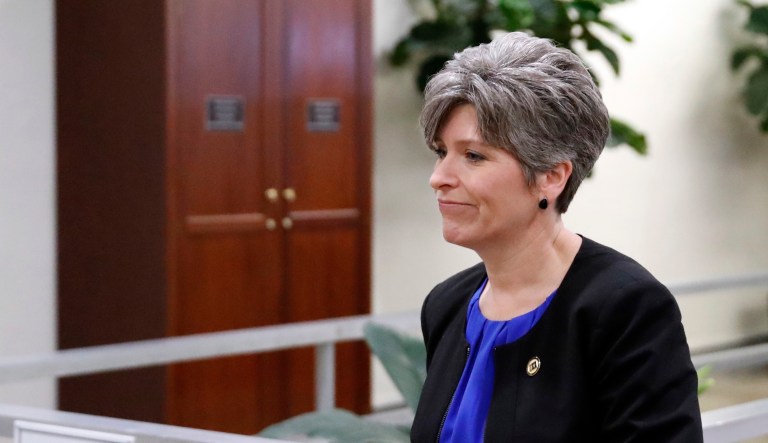 Sen. Joni Ernst, R-Iowa, arrives for a vote on Capitol Hill, May 17, 2018, in Washington.