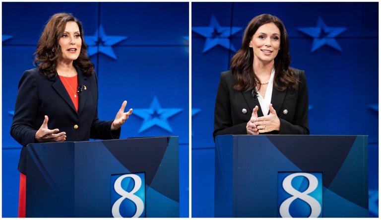Gretchen Whitmer (D) and Tudor Dixon (R) face off in a debate in Grand Rapids, Michigan.