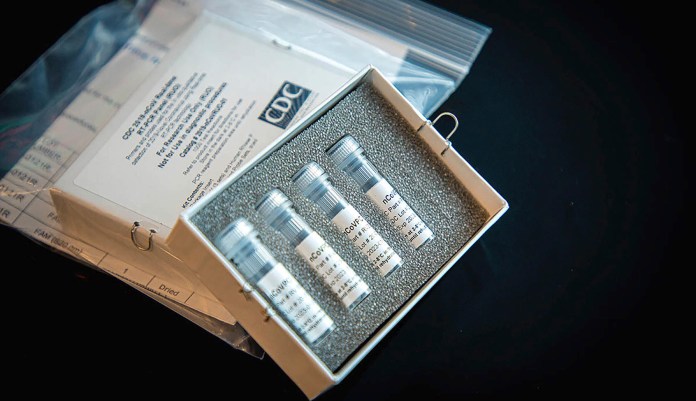 Hundreds of thousands of COVID-19 test kits recalled over false positive concerns
