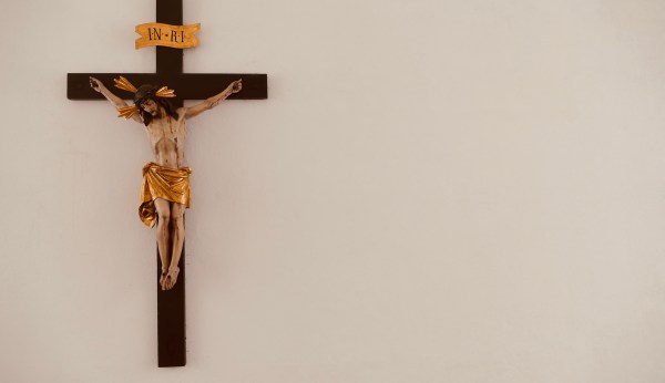 Teenager accused of revenge murder of pedophile priest by shoving crucifix down his throat