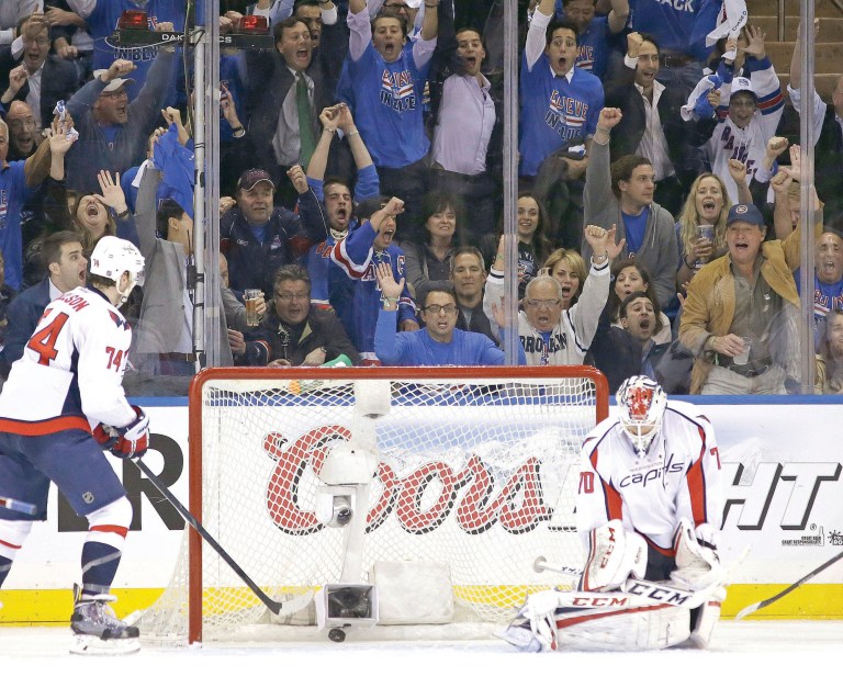 Kathy Willens/AP
Capitals goalie Braden Holtby had 26 saves but allowed Derek Stepan to score the game-winner in New York's Game 3 win over Washington on Tuesday.