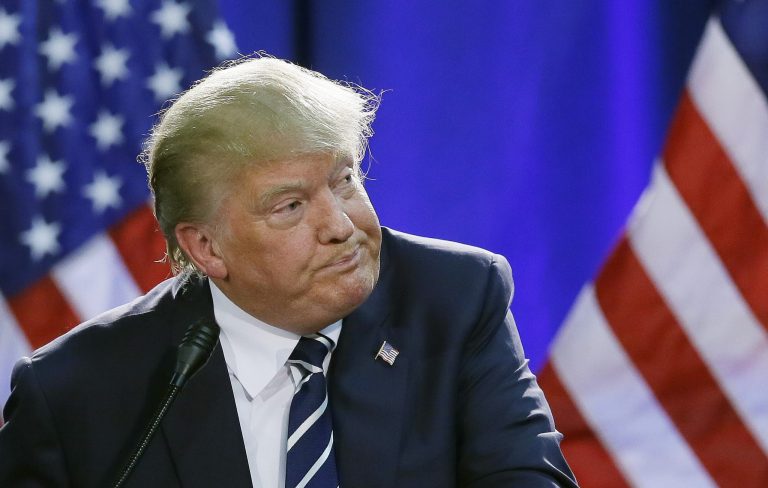 Republican presidential candidate Donald Trump addresses a GOP fundraising event, Tuesday, Aug 11, 2015, in Birch Run, Mich. (AP Photo/Carlos Osorio)