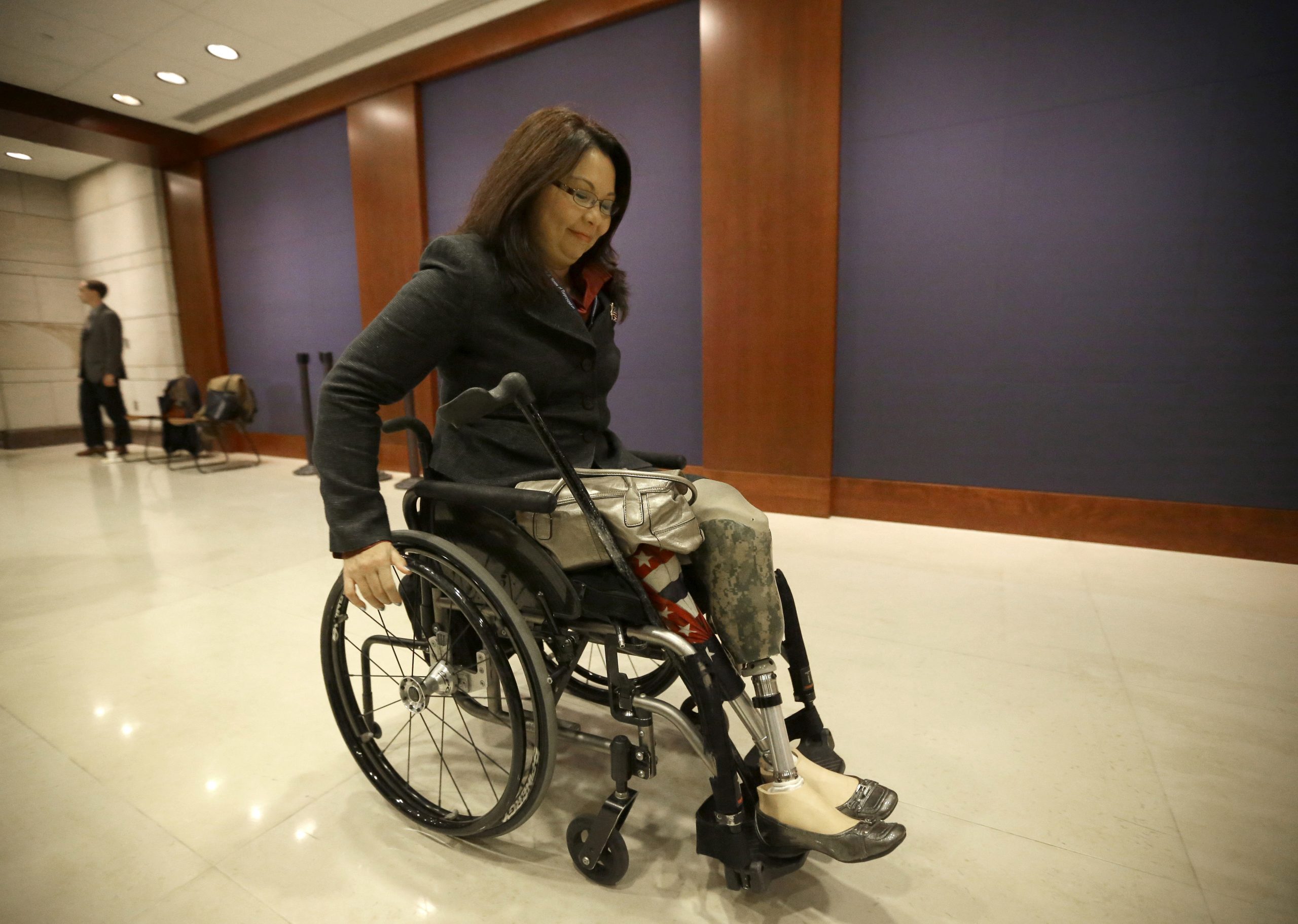 Female veterans highlight military experience in quest for Congress