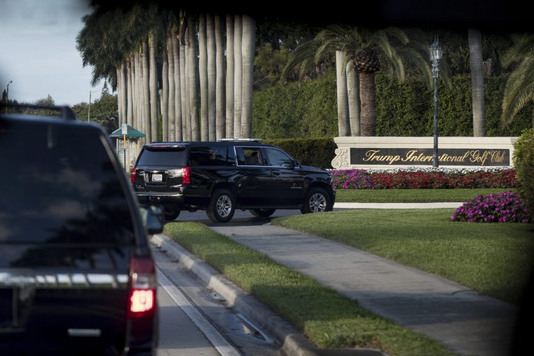 A motorcade carrying President-elect Donald Trump arrives at Trump International Golf Club, in West Palm Beach, Fla., Friday, Dec. 23, 2016. (AP Photo/Andrew Harnik)