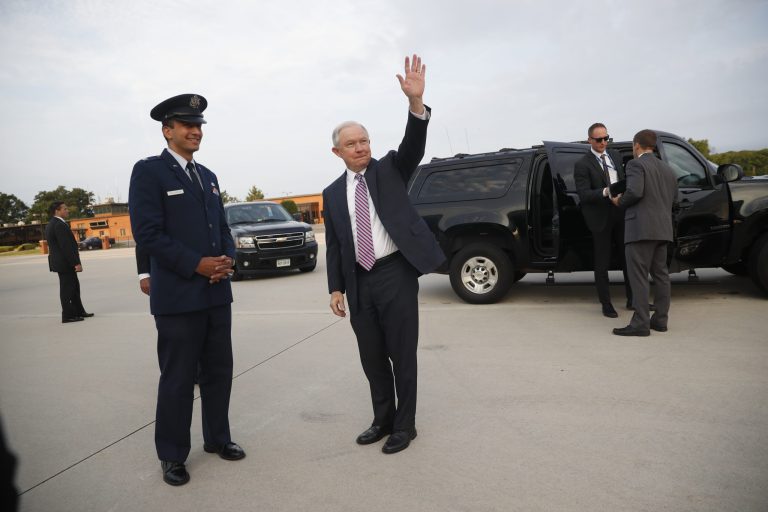 Attorney General Jeff Sessions boards his plane at Andrews Air Force Base, Md., Thursday, July 27, 2017. Sessions is traveling to El Salvador to meet with local leaders and discuss their efforts to fight gangs like MS-13. (AP Photo/Pablo Martinez Monsivais)