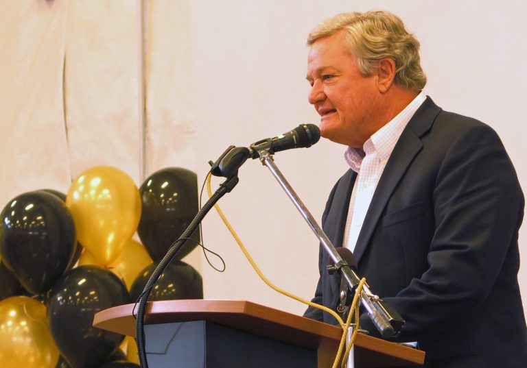 Gov. Jack Dalrymple addresses guests at a celebration marking North Dakota reaching the million barrels a day oil production level in Tioga, N.D. on Wednesday, June 25, 2014. The state passed the million barrel a day production milestone in April. (AP Photo/Josh Wood)