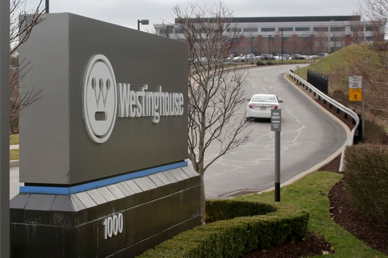 Vehicles move along the entrance to Westinghouse International Headquarters on Wednesday, March 29, 2017 in Cranberry, Pa., Butler county. Japan's embattled Toshiba Corp. says its U.S. nuclear unit Westinghouse Electric Co. has filed for bankruptcy protection, marking a key step in its struggles to stop the flow of massive red ink. (AP Photo/Keith Srakocic)