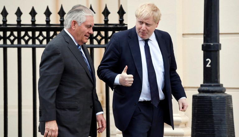 U.S. Secretary of State Rex Tillerson, left, is welcomed by Britain's Foreign Secretary Boris Johnson in London, Monday Jan. 22, 2018. (Toby Melville/Pool via AP)