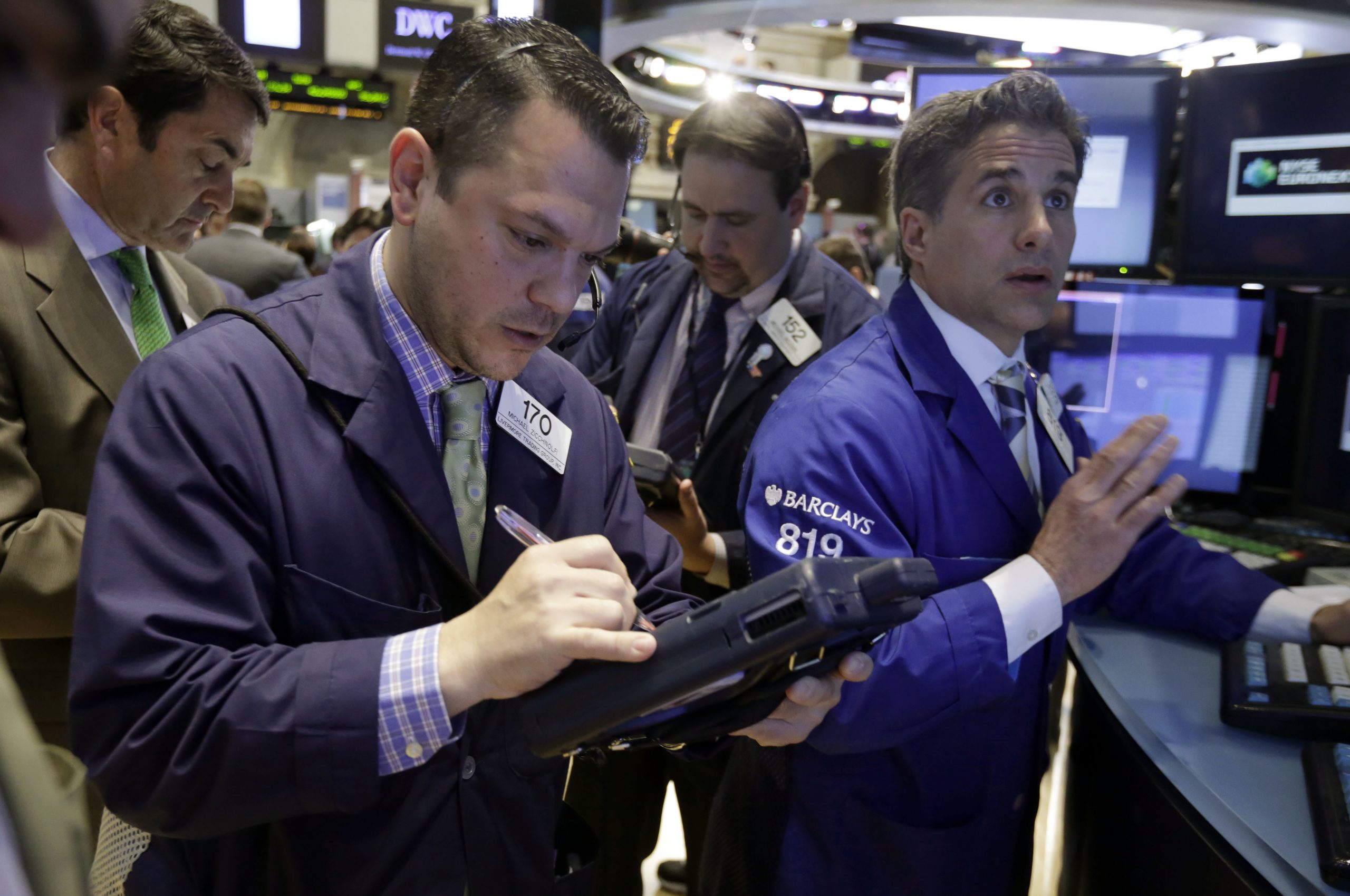 Stocks edge higher; Dow reaches another record