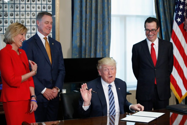 Trump's offhand remarks about his executive orders were made in jest. (AP Photo/Alex Brandon)