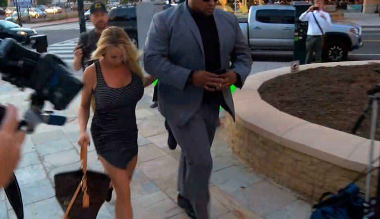 In this image from video, Stormy Daniels arrives at the strip club Cloakroom for a performance Monday, July 9, 2018, in Washington.