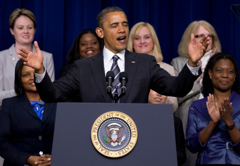 Obama aggressively targets Romney, re-election
