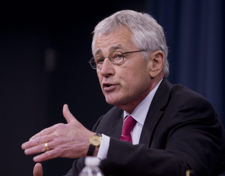Defense Secretary Chuck Hagel speaks during a news conference at the Pentagon, Wednesday, Dec. 4, 2013. Hagel said cutting his Pentagon staff by 20 percent will save at least $1 billion over five years.  (AP Photo/Manuel Balce Ceneta)