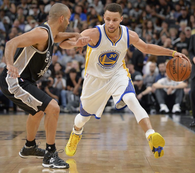 Golden State Warriors guard Stephen Curry, right, a likely NBA All Star next year, will not be playing in North Carolina if senators get their way. (AP Photo/Darren Abate)