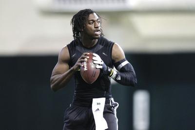 Tony Gutierrez/AP
The mother of Robert Griffin III said she believes her son will