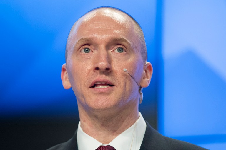 Carter Page, a former foreign policy adviser to President Trump during the campaign, said he'll have to wait for transcripts obtained from government surveillance to definitively say that he didn't promise Russian associates that Trump would be open to relaxing sanctions on Russia. (AP Photo/Pavel Golovkin, file)