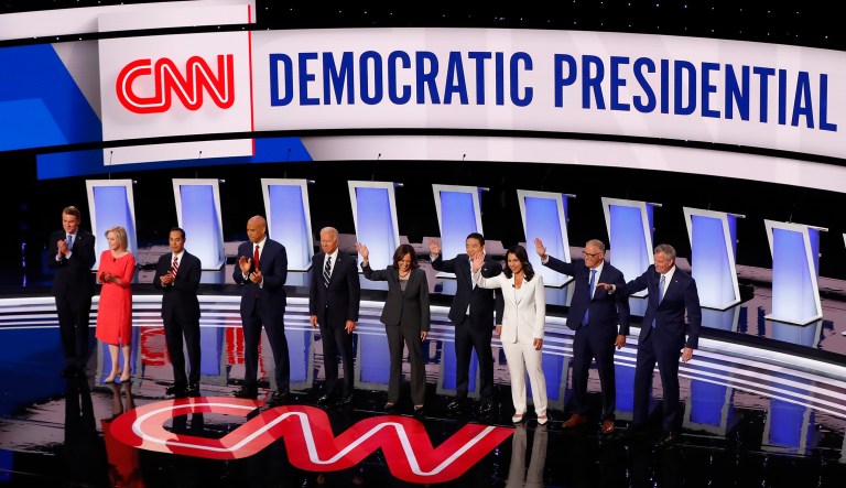 From left, Sen. Michael Bennet, D-Colo., Sen. Kirsten Gillibrand, D-N.Y., former Housing and Urban Development Secretary Julian Castro, Sen. Cory Booker, D-N.J., former Vice President Joe Biden, Sen. Kamala Harris, D-Calif., Andrew Yang, Rep. Tulsi Gabbard, D-Hawaii, Washington Gov. Jay Inslee and New York City Mayor Bill de Blasio are introduced before the second of two Democratic presidential primary debates hosted by CNN Wednesday, July 31, 2019, in the Fox Theatre in Detroit.