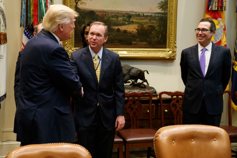 Trump budget and economic advisers portray their differing statements on the issue as normal, given their distinct roles. (AP Photo/Evan Vucci)