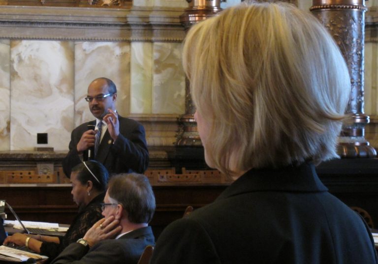 Kansas state Sen. David Haley, left, a Kansas City Democrat, debates anti-abortion legislation with Sen. Mary Pilcher-Cook, a Shawnee Republican, Friday, April 5, 2013, at the Statehouse in Topeka, Kan. Haley opposes the bill's new restrictions on abortion providers, while Pilcher-Cook supports them. (AP Photo/John Hanna)