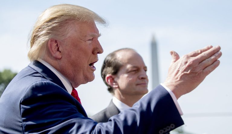 President Donald Trump, accompanied by Labor Secretary Alex Acosta, right, speaks to members of the media on the South Lawn of the White House in Washington, Friday, July 12, 2019, before Trump boards Marine One for a short trip to Andrews Air Force Base, Md. and then on to Wisconsin. Trump says Labor Secretary Alex Acosta to step down, move comes in wake of handling of Jeffrey Epstein case.