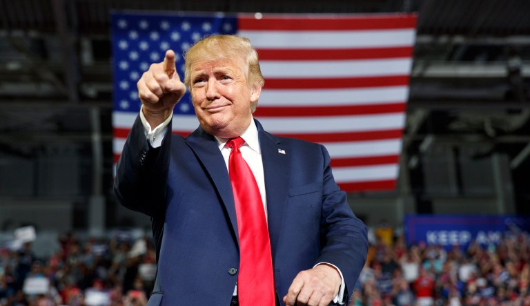 President Donald Trump gestures to the crowd as he arrives to speak at a campaign rally at Williams Arena in Greenville, N.C., Wednesday, July 17, 2019.