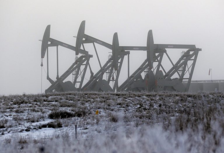 The effects of a $10 tax on crude oil would be vast, according to the Congressional Research Service. (AP Photo/Eric Gay)