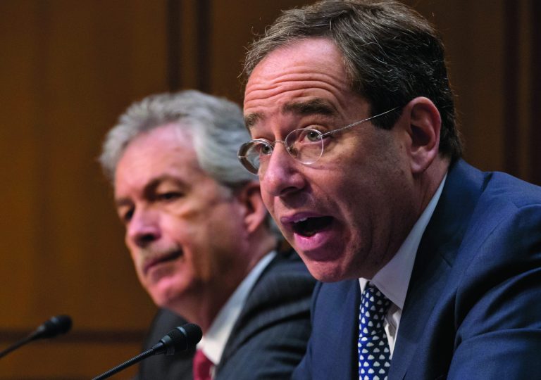 The Senate Foreign Relations Committee holds a hearing with Deputy Secretary of State Thomas Nides, right, who is in charge of management, and Deputy Secretary of State William Burns,left, who is in charge of policy, after an independent review panel said this week that serious bureaucratic mismanagement was responsible for inadequate security at the mission in Benghazi, Libya, where the U.S. ambassador and three other Americans were killed on Sept. 11, on Capitol Hill in Washington, Thursday, Dec. 20, 2012. Secretary of State Hillary Rodham Clinton had been scheduled to testify but canceled after fainting and sustaining a concussion last week. (AP Photo/J. Scott Applewhite)