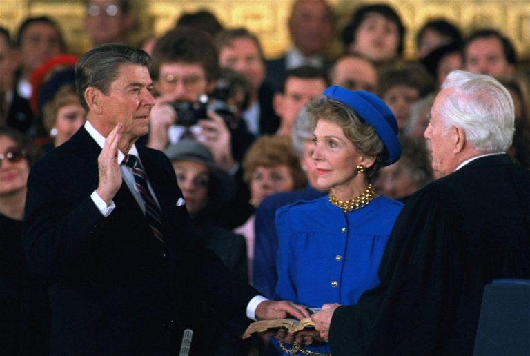 In this Jan. 21, 1985 file photo, first lady Nancy Reagan watches as President Ronald Reagan is sworn in during ceremonies in the Rotunda beneath the Capitol Dome in Washington. (AP Photo/Ron Edmonds)