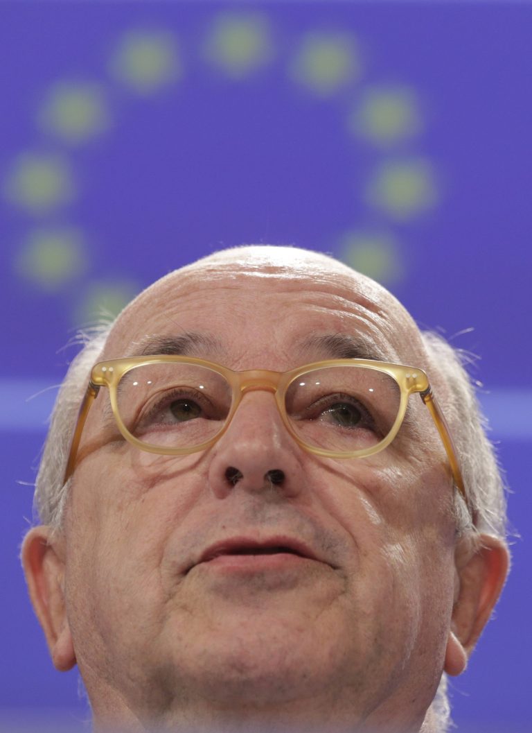EU Commissioner for competition Joaquin Almunia addresses the media at the European Commission headquarters in Brussels, on Wednesday Oct. 8, 2014. The European Union's competition watchdog has accepted Britain's bid to heavily subsidize the construction and operation of a new 16-billion pound (dollars 26 billion) nuclear power plant. (AP Photo/Yves Logghe)