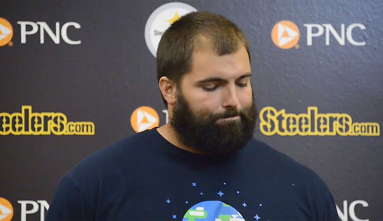 On an NFL Sunday filled with protests, the most indelible image might have been former Army Ranger and Pittsburgh Steelers Offensive Lineman Alejandro Villanueva (pictured). The Army Ranger veteran stood alone with his hand over his heart. His team could not agree on a unified means of demonstration -- stand, kneel, or sit -- so they opted to remain in the locker room. (Lake Fong/Pittsburgh Post-Gazette via AP)