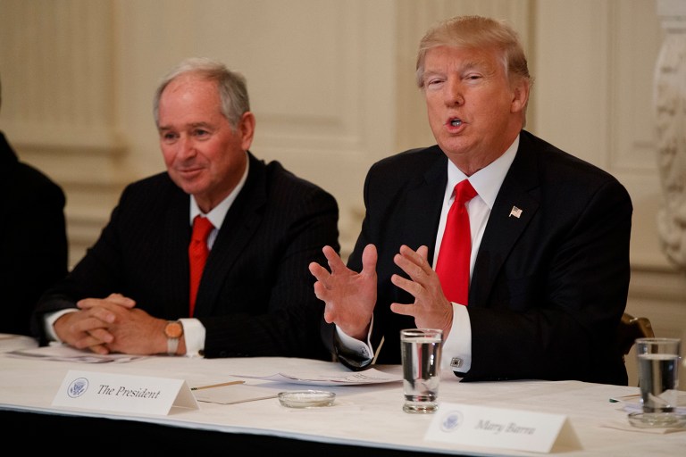 Blackstone CEO Stephen Schwarzman listens as President Trump speaks during a meeting with business leaders. (AP Photo/Evan Vucci)