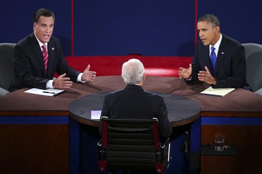Republican presidential nominee Mitt Romney and President Barack Obama answer a question during the third presidential debate at Lynn University, Monday, Oct. 22, 2012, in Boca Raton, Fla. (AP Photo/Pool-Win McNamee)