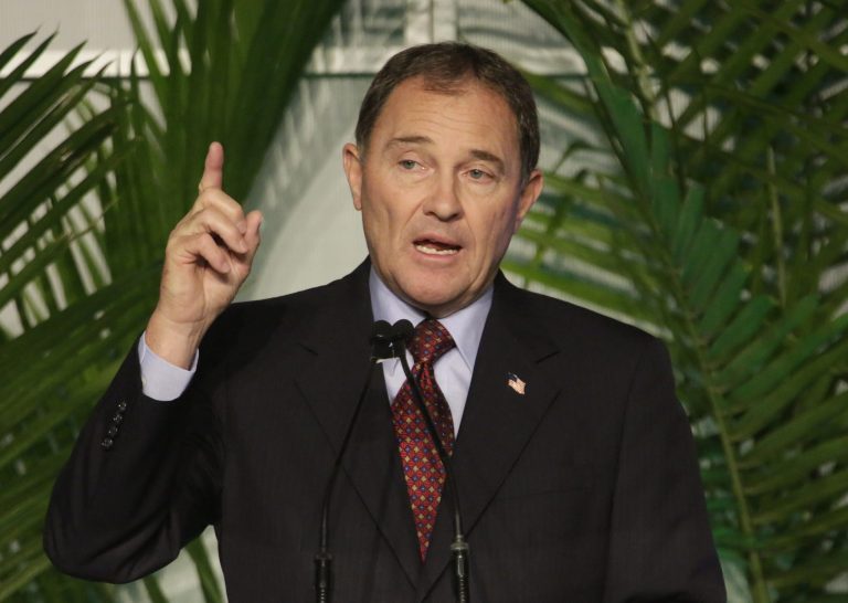 Utah Gov. Gary Herbert speaks during the third-annual Energy Development Summit Wednesday, June 4, 2014, in Salt Lake City. Herbert says President Barack Obama's new plan to cut pollution discharged by America's power plants over the next two decades will likely raise electricity rates for consumers and cost the state jobs.  (AP Photo/Rick Bowmer)
