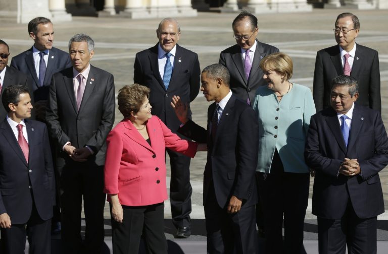   FILE - In this Sept. 6, 2013, file photo President Barack Obama, center, talks with Brazil's President Dilma Rousseff as he join with other leaders for the group photo at the G-20 summit at the Konstantin Palace in St. Petersburg, Russia. President Barack Obama's national security adviser conceded there are legitimate questions about U.S. spying on its allies, the White House said Wednesday, Sept. 11, 2013, as it sought to sooth Brazil's concerns about far-reaching surveillance by the National Security Agency. (AP Photo/Pablo Martinez Monsivais, File)  